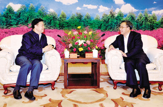 胡春华会见中国海洋石油总公司董事长王宜林